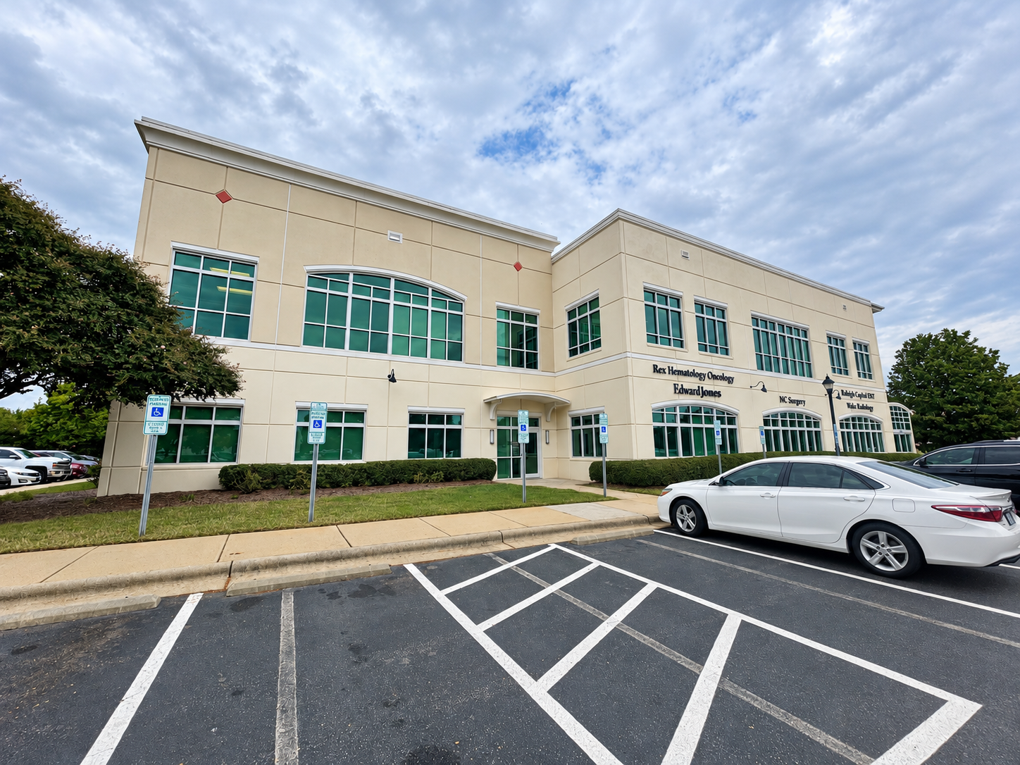 Exterior windows at a two-story medical and office building serviced by Patriot Softwash in Raleigh, NC